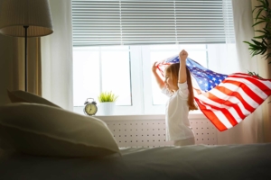 Little girl holding an American flag